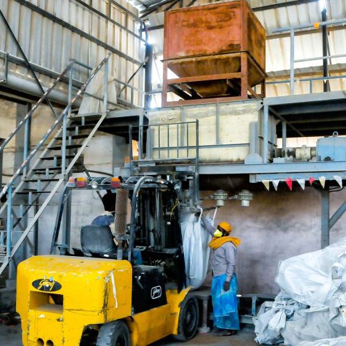 Dry mix manufacturing plant with automated material handling and packaging system